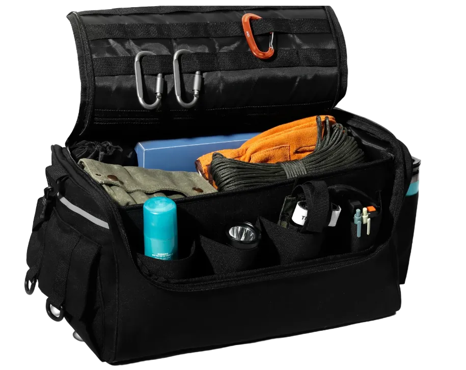 Black tactical bag with various items inside on a white background