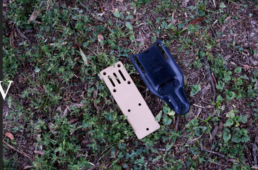 Duty belt hanger with holster